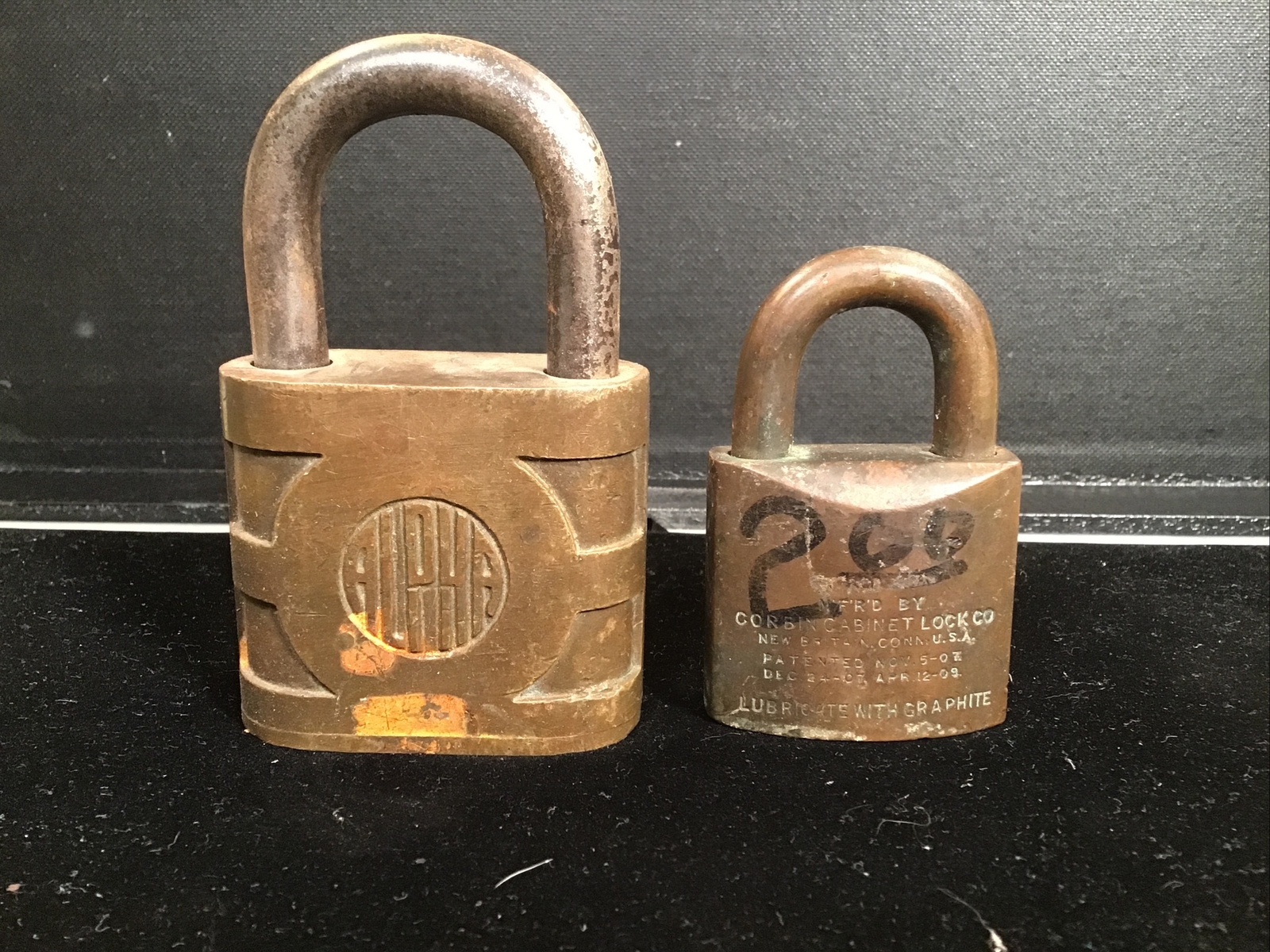 2 Vintage Padlocks. “Alpha” & “Corbin”. No Keys.
