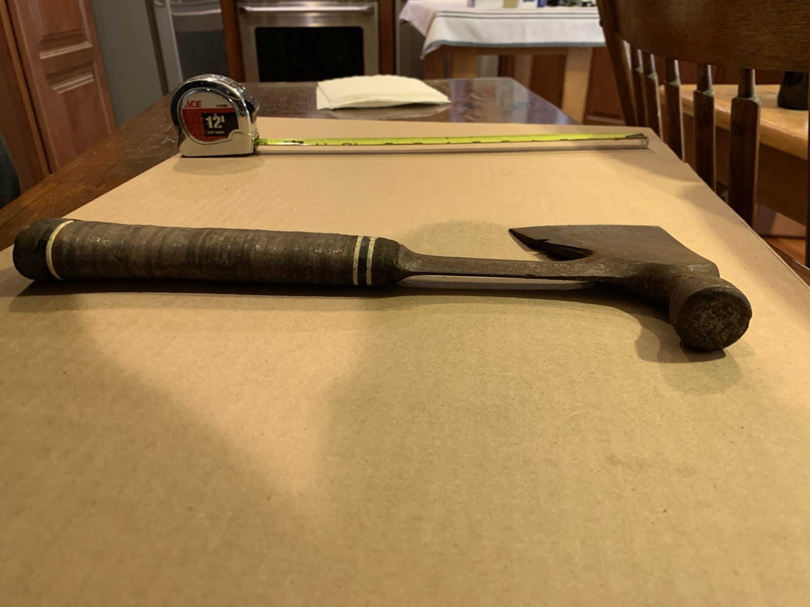 Vintage Estwing stacked leather carpenter axe 13 inch overall.