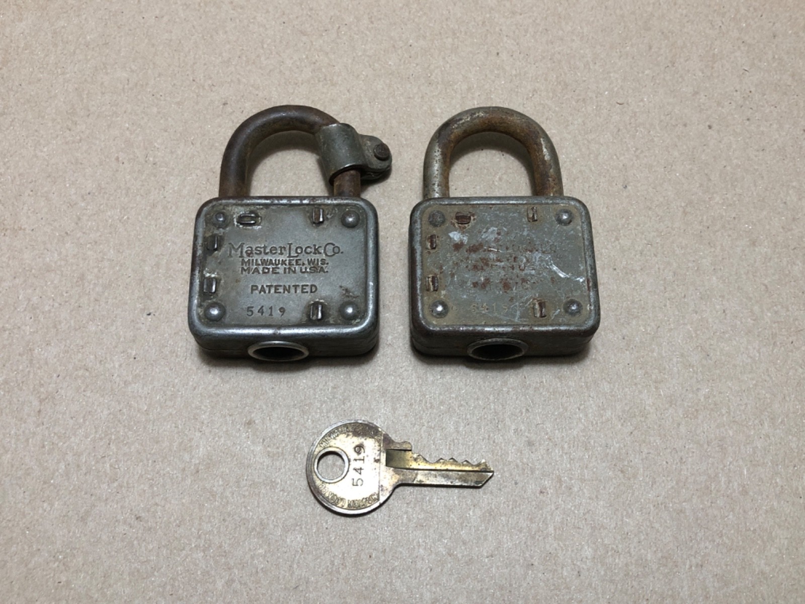 Vintage Master Lock Co. # 77 X2 Lot Embossed Lion Head Lock with Key USA Works