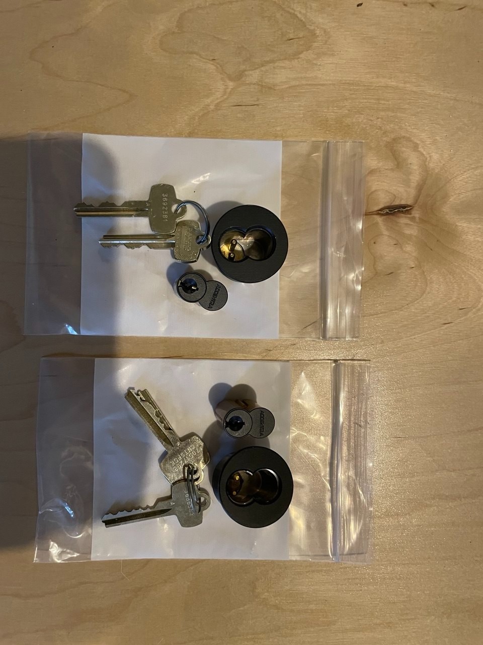 LOT OF 2 BEST A SFIC CORES WITH HOUSINGS WITH 2 KEYS EACH BLACK