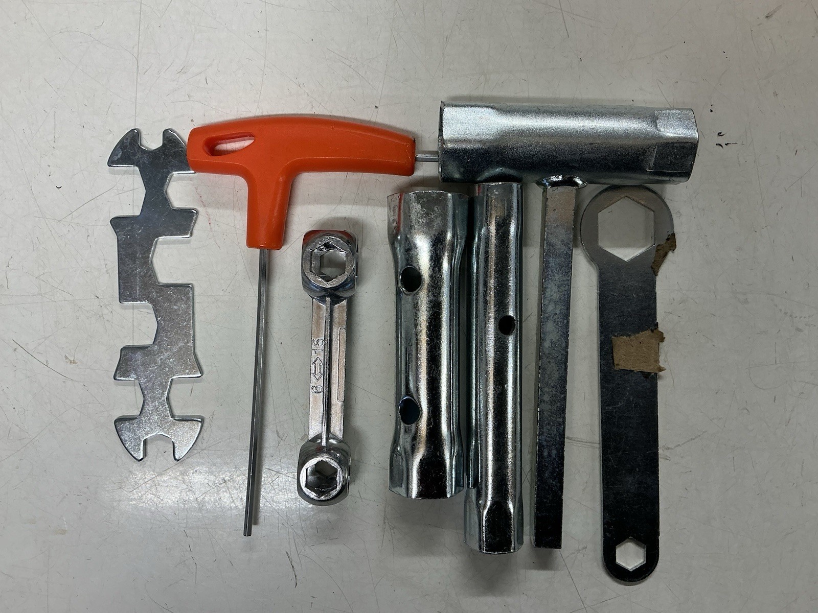 Box spanner with various tools (bike repair tools)