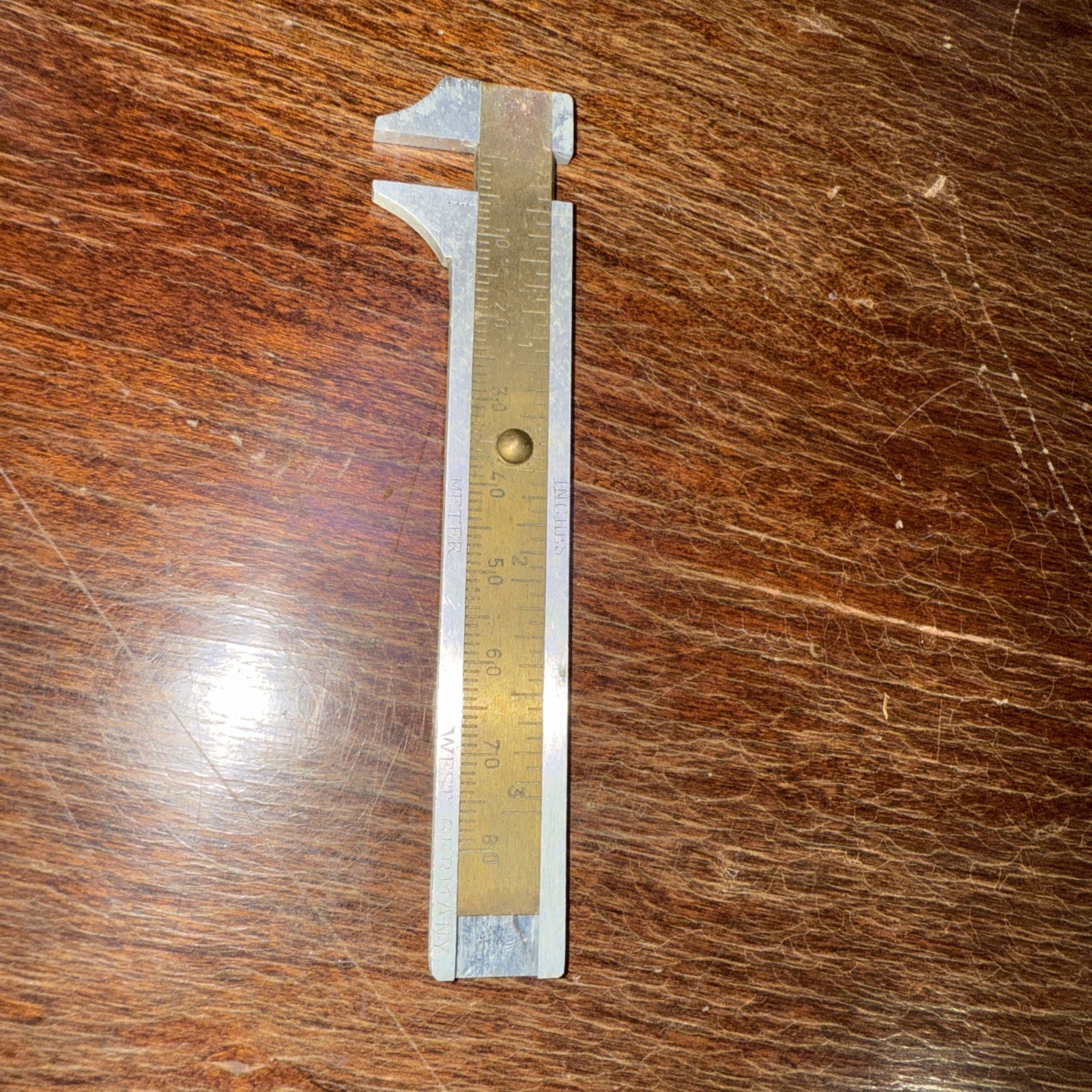 BRASS 4” POCKET SIZE OUTSIDE SLIDE CALIPER TOOL MADE IN WEST GERMANY