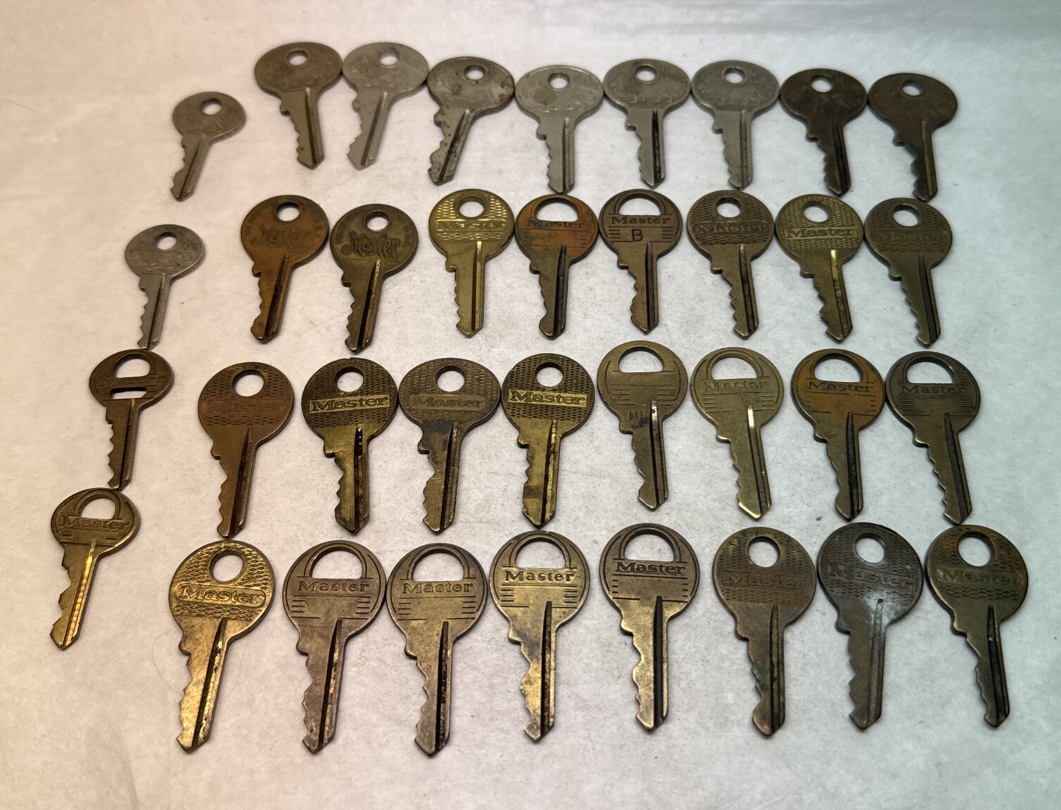 36 Old Vintage Ornate Lion Master Lock Padlock Key s Nickel Brass Milwaukee WI
