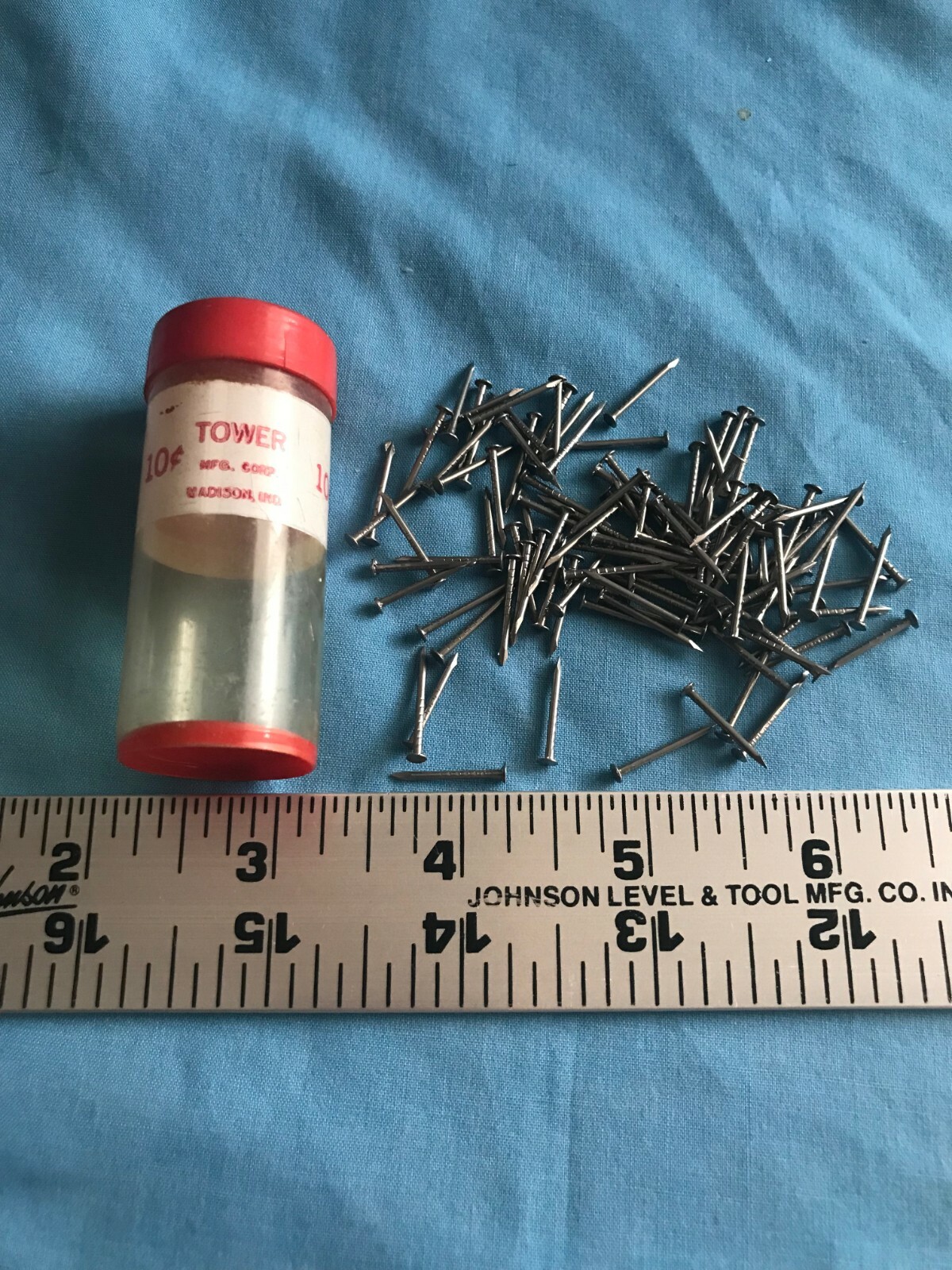 Pre-Owned Vintage Tower Mfg. Corp. Plastic Red & White Container w/ 5/8″ Nails