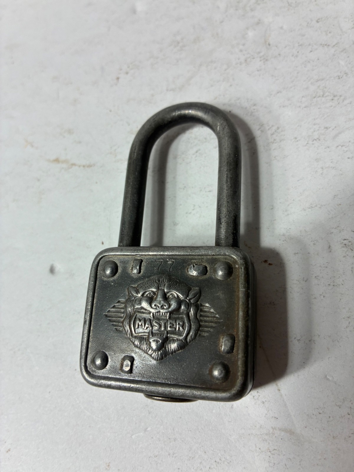 VINTAGE MASTER LOCK CO. No. 77 LION HEAD PADLOCK. No key