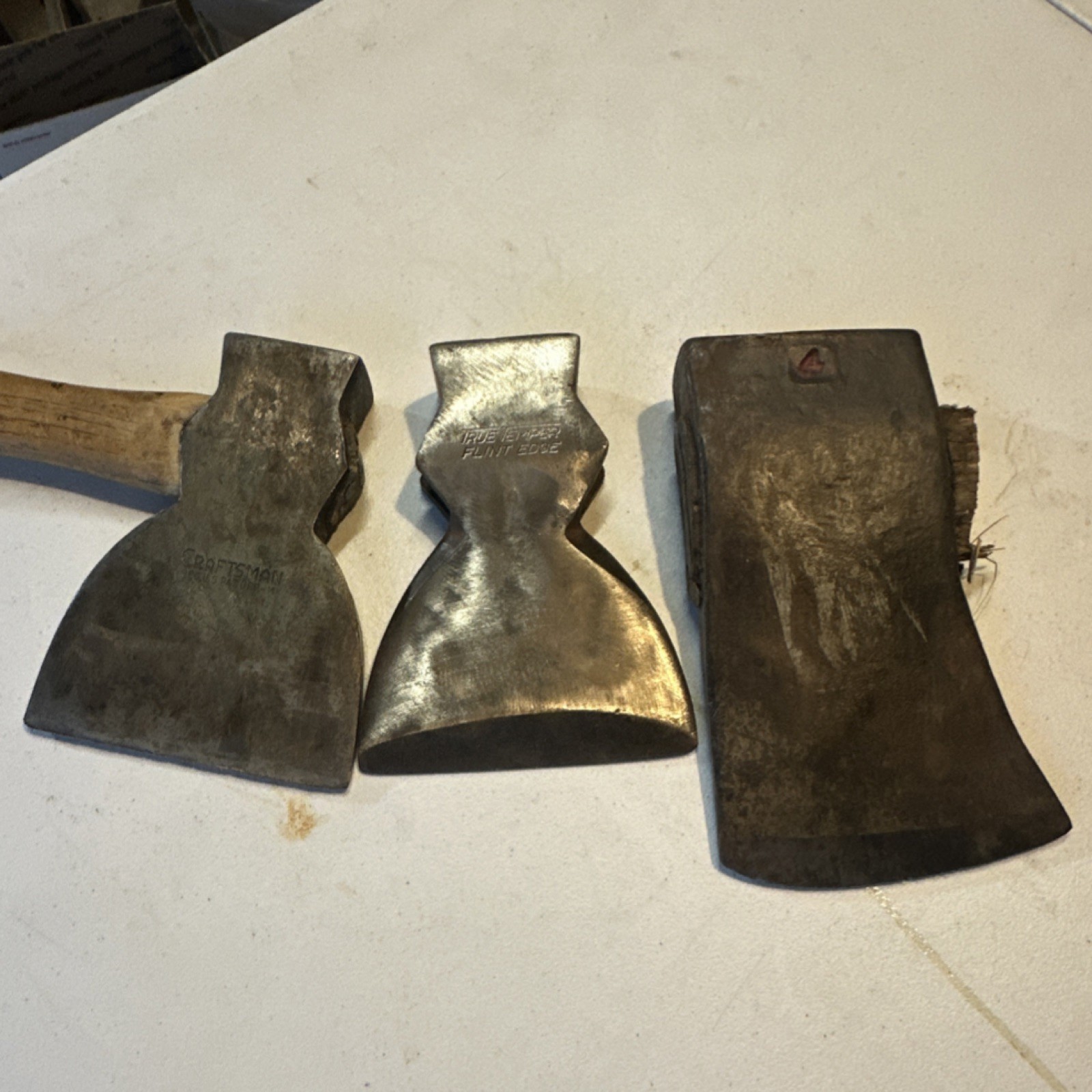 lot of 3 axes one is tt the other is craftsman and the bigger is council