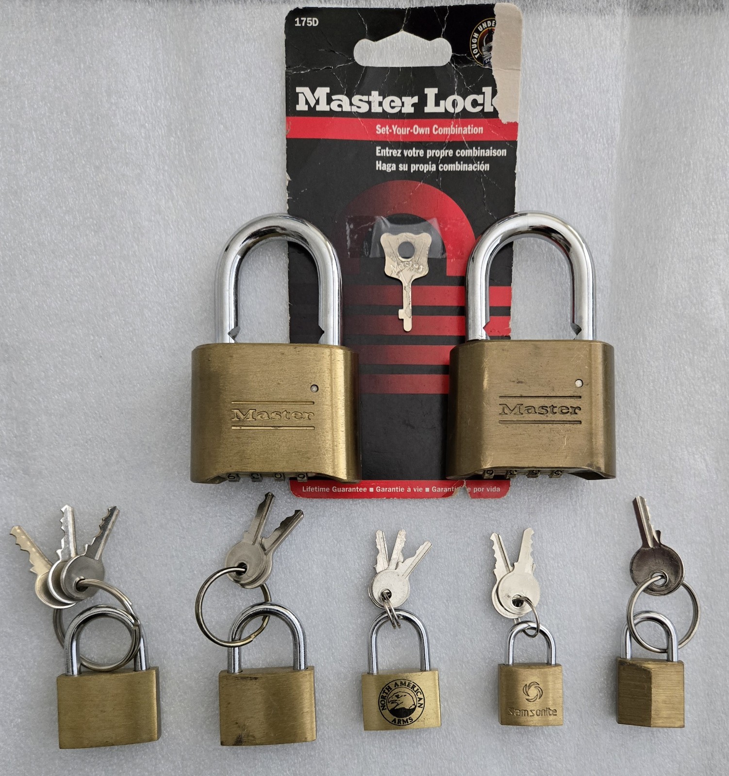 Brass Padlocks vary in size. Large ones have combination-provided. Others keys.