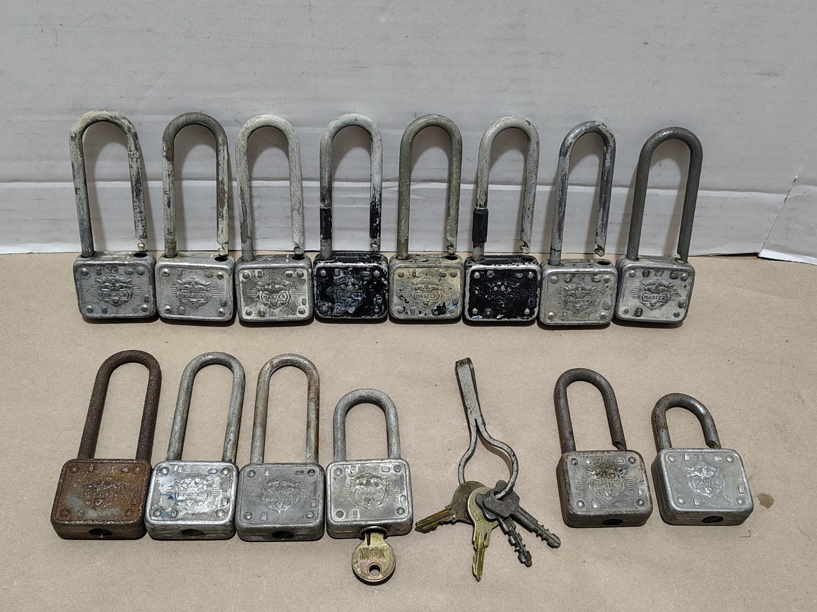 Lot of 14 Vintage Master Lock Co. #77 Lion Head Padlock – No Keys That Work