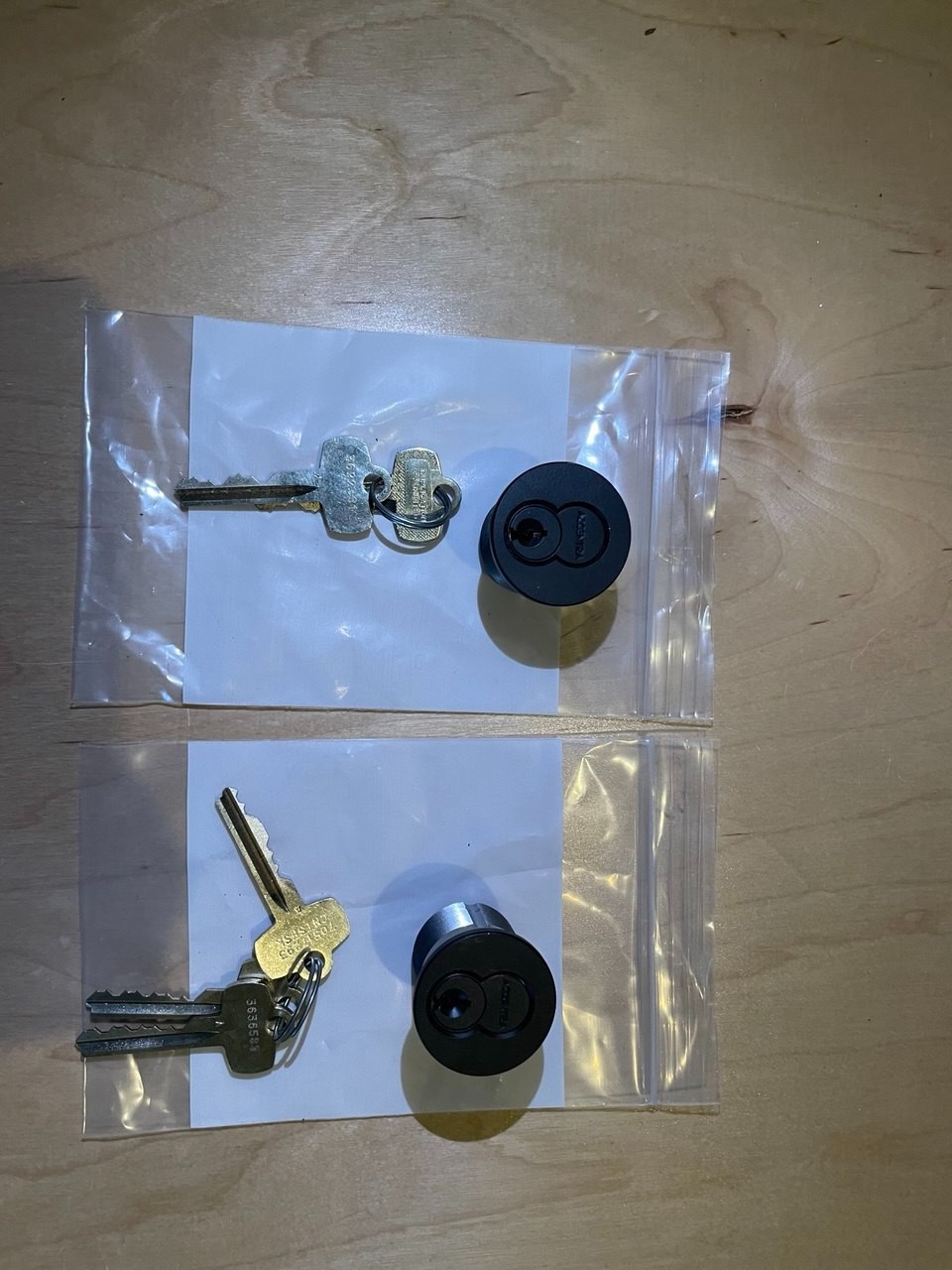 LOT OF 2 BEST A SFIC CORES WITH HOUSINGS WITH 2 KEYS EACH BLACK