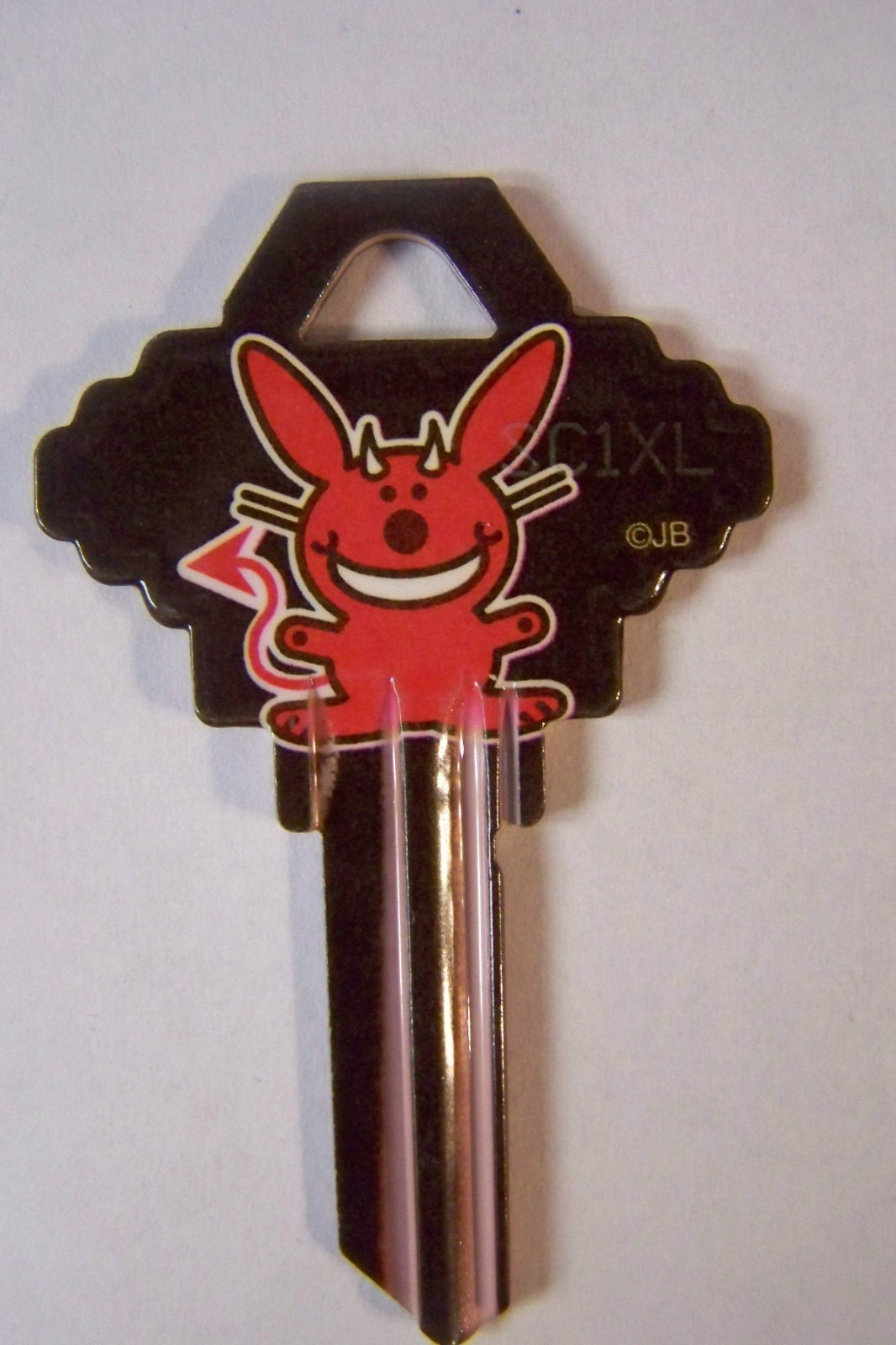 Happy Bunny Angel/Devil Schlage SC1 house key blank.