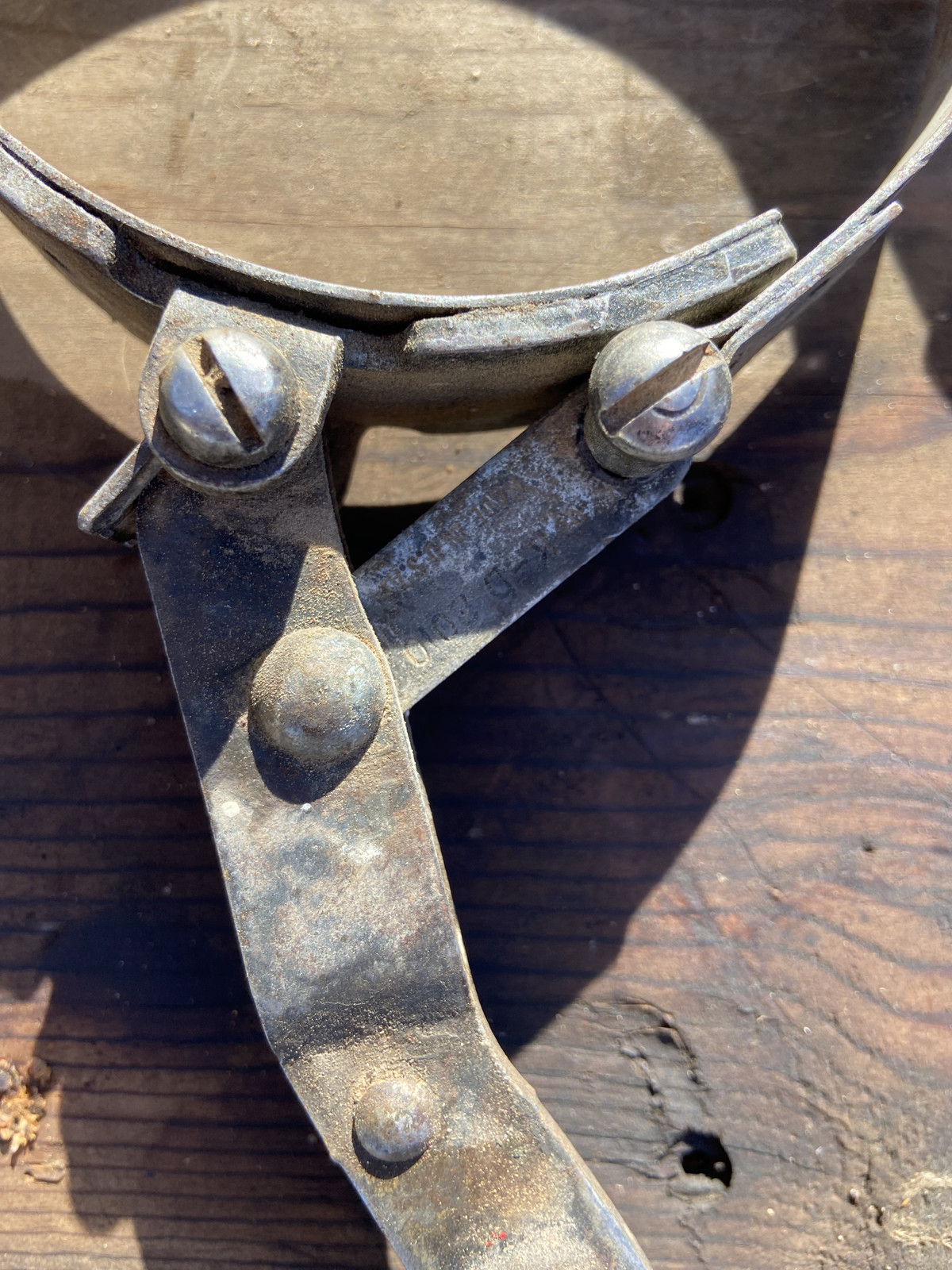 Vintage collection of 5 oil filter wrenches and a chain tool