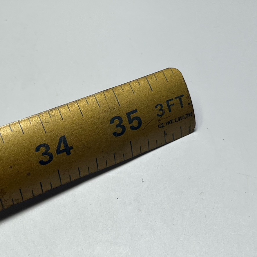 Vintage LUFKIN Magic Yard Stick Metal Roll-Up Slap Ruler, 36″ Bell System Advert