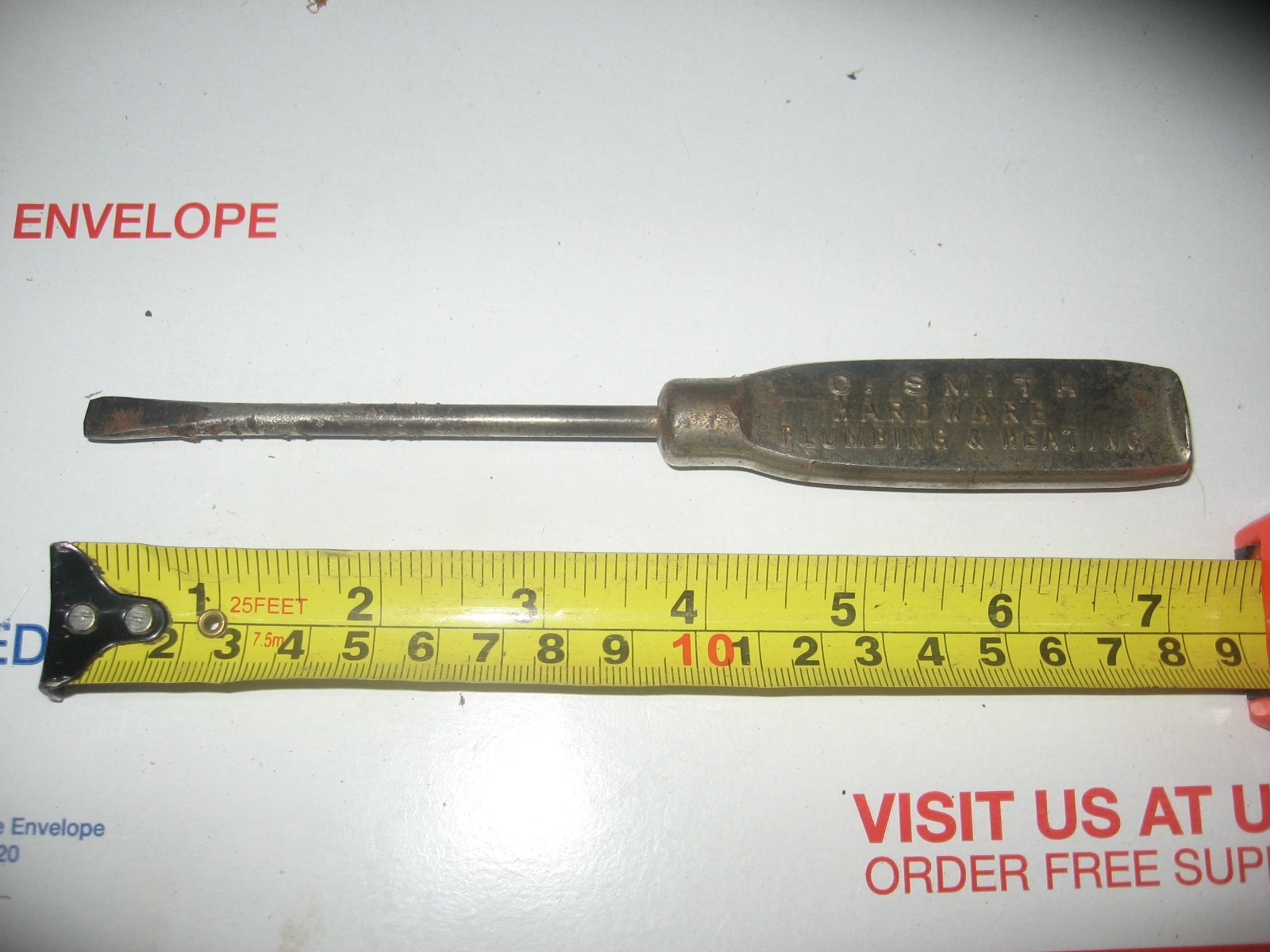 OLD SCREWDRIVER STAMPED C. S. SMITH HARDWARE AND PLUMBING