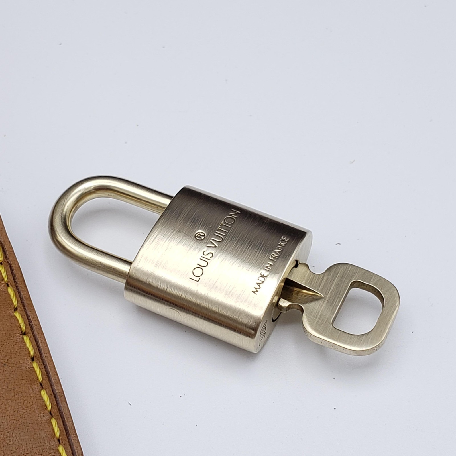 Authentic Louis Vuitton Gold Padlock In Excellent Shiny Brass 011526