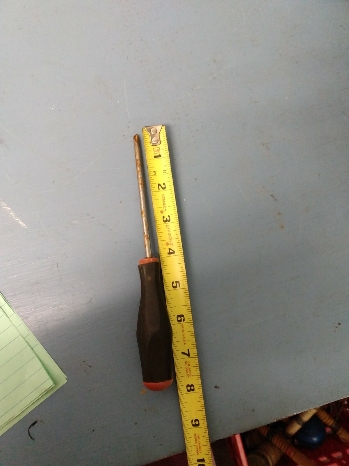 Phillips Head Screwdriver black and red handle. (Cm)