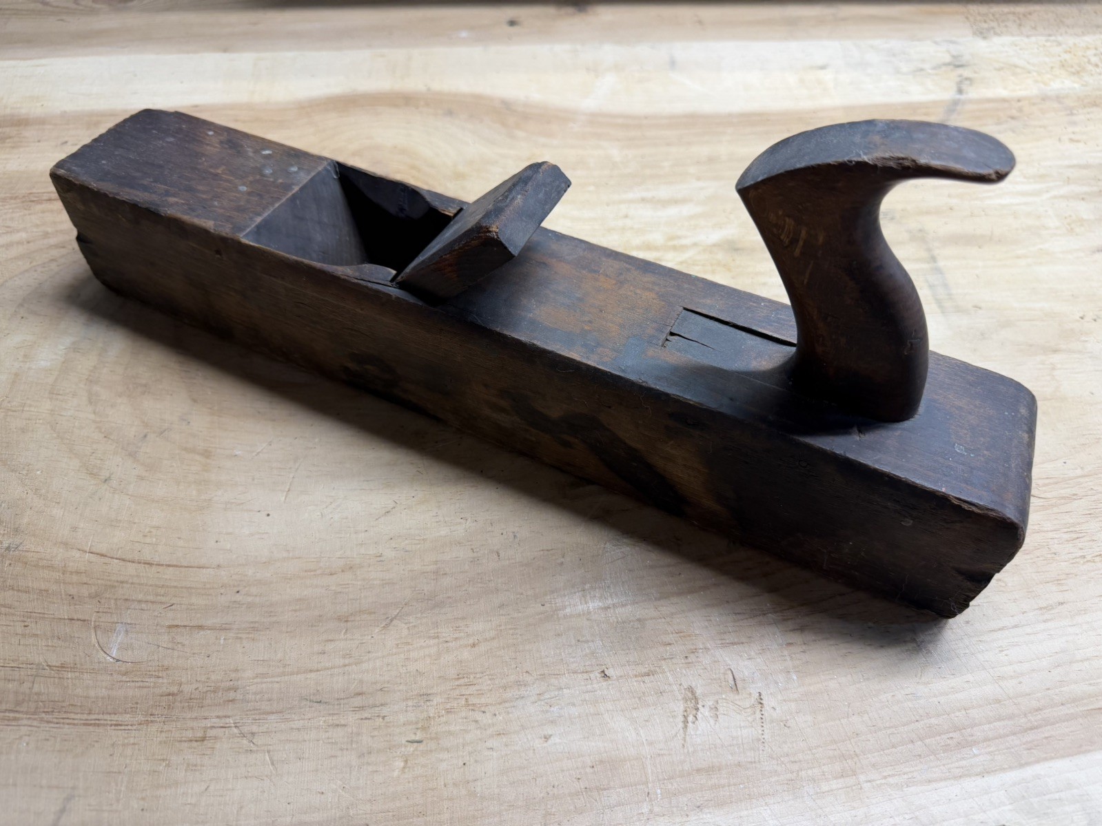 Antique wooden hand plane marked “Edward Carter – Troy, NY.”