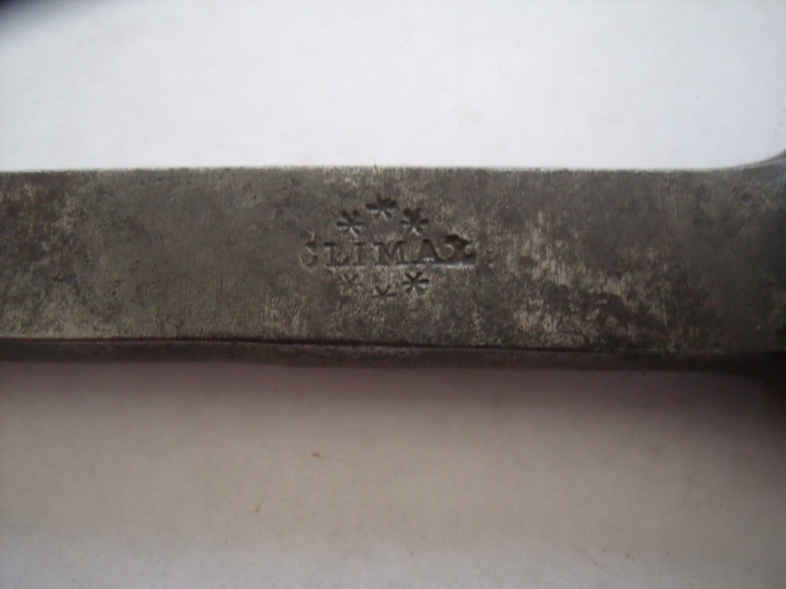 Coventry Climax 4 way multi spanner. 4″ long.