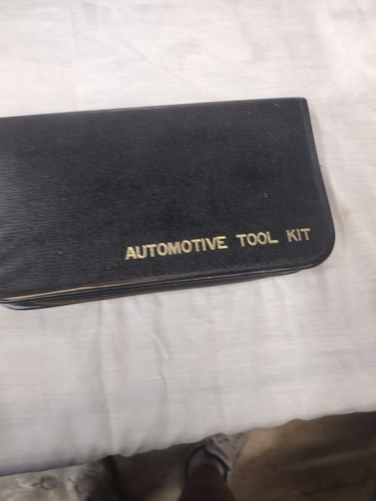 vintage automotive tool kit in zipper case