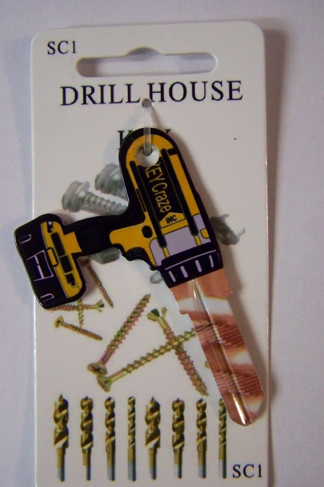 Drill Schlage SC1 house key blank