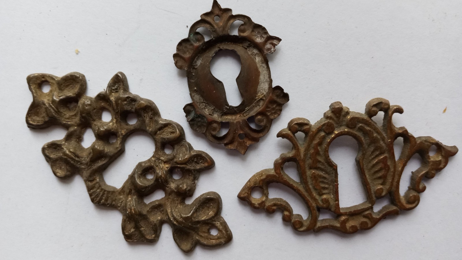 Three Antique Brass Key Holes #695