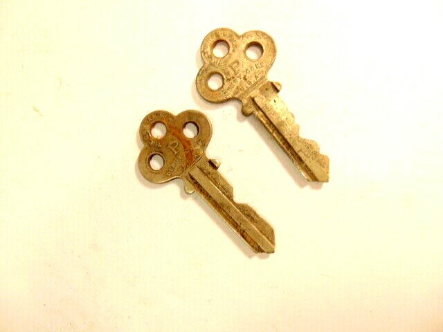 2 old keys with a large “P” on each side: The Graham Mfg Co., Derry Conn.