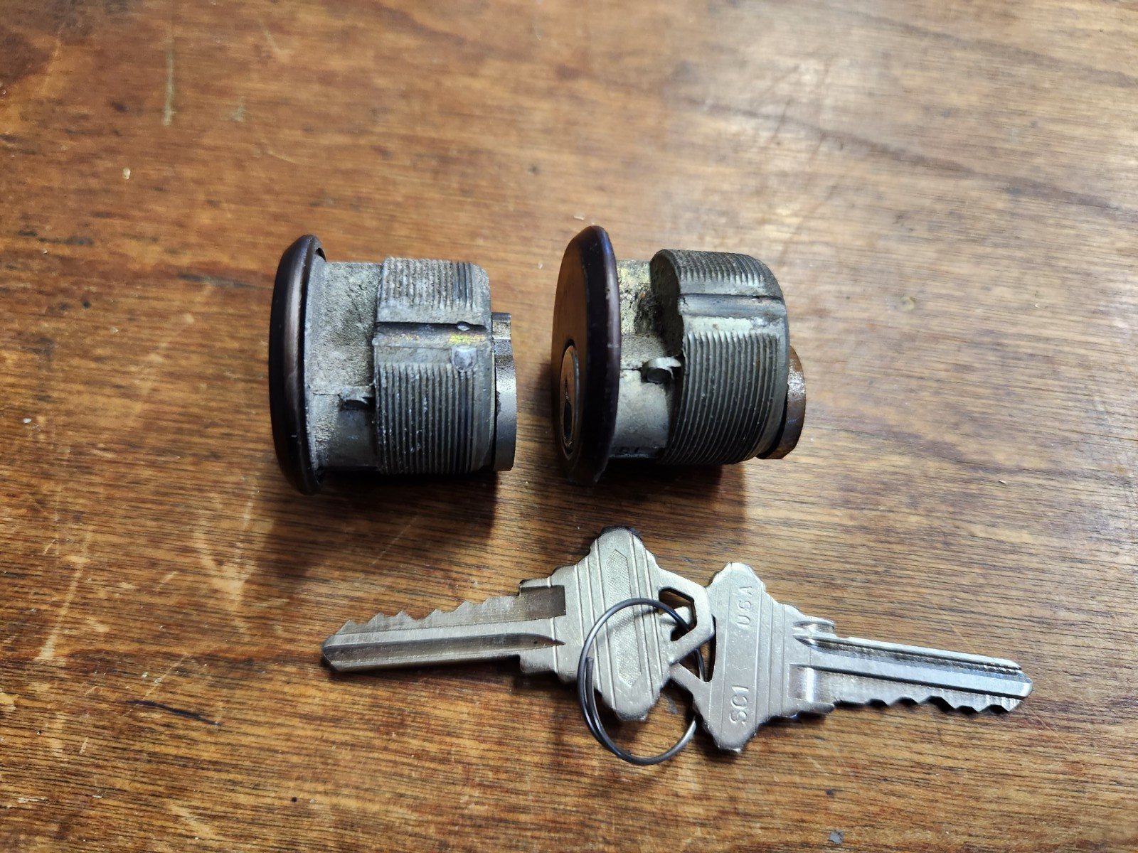 Locksmiths! 1 pair used duranodic 1″ mortise cylinders keyed alike w/2keys