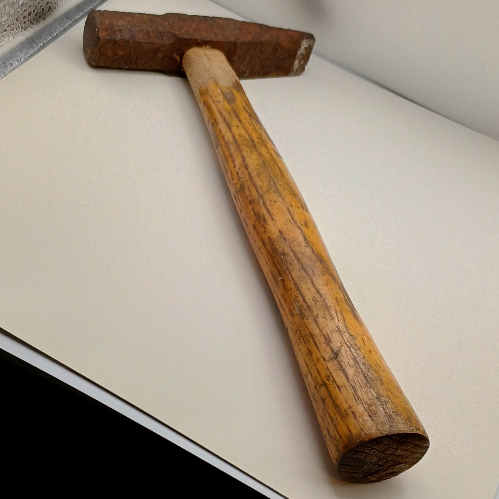 Vintage Blacksmith Hammer with Wooden Handle and Rusted Metal Head Tool