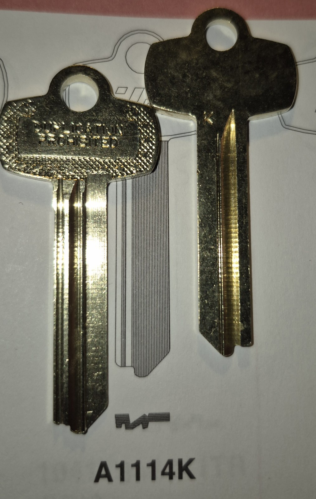 Best, A1114K, 1A1K1, 1114K, 114K Key Blank. Stamped “Duplication Prohibited.”