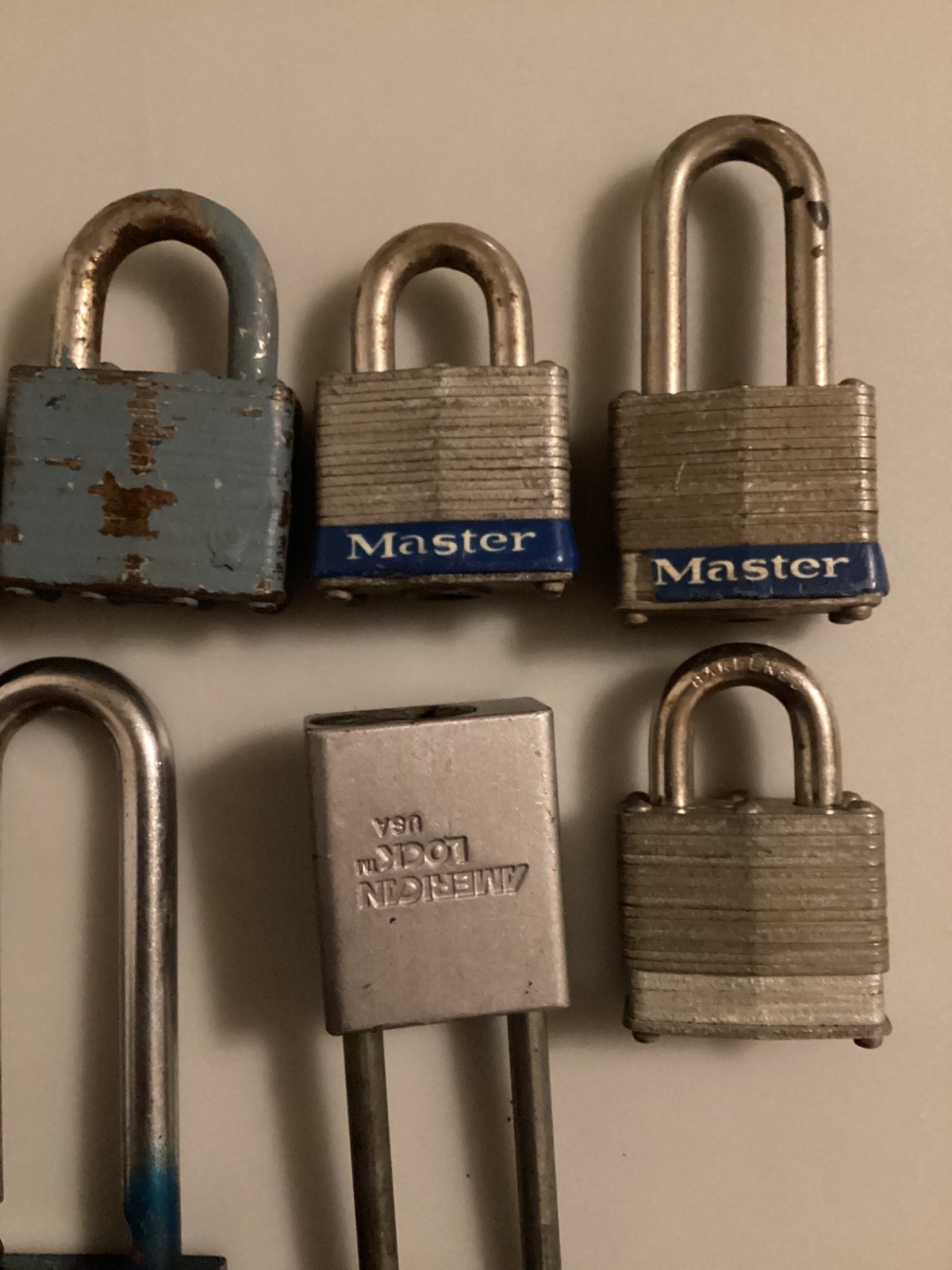 12 TWELVE PADLOCKS SEVEN MASTERLOCKS, SIX AMERICAN LOCKS, NO KEYS