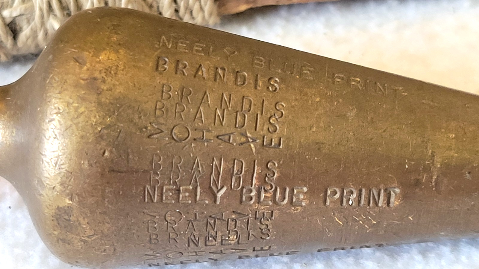 Antique Brass Plumb Bob Brandis. Multiple stampings.
