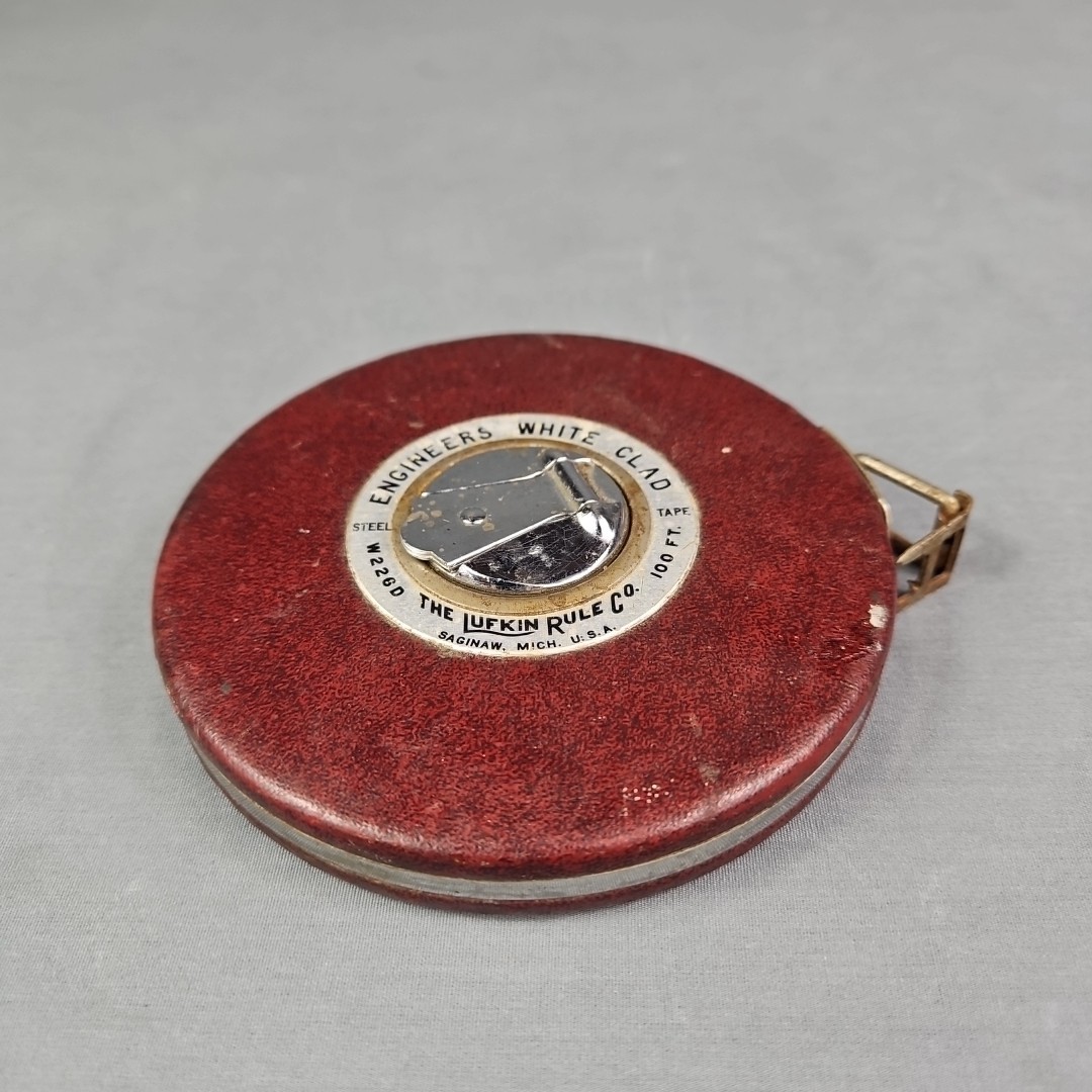 VINTAGE LUFKIN RULE CO. WHITE CLAD 100ft STEEL Banner MEASURING TAPE Maroon USA