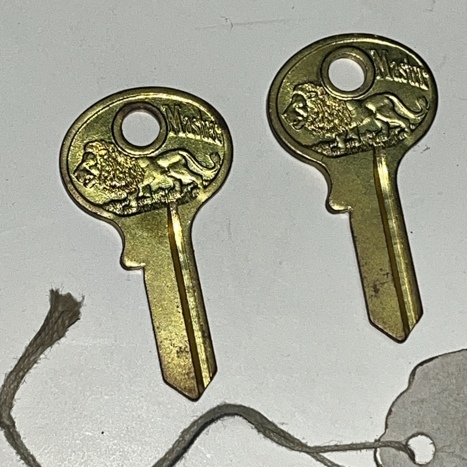 One Dozen Master Padlock Keys, Uncut, Blanks, All Brass, All Walking Lions