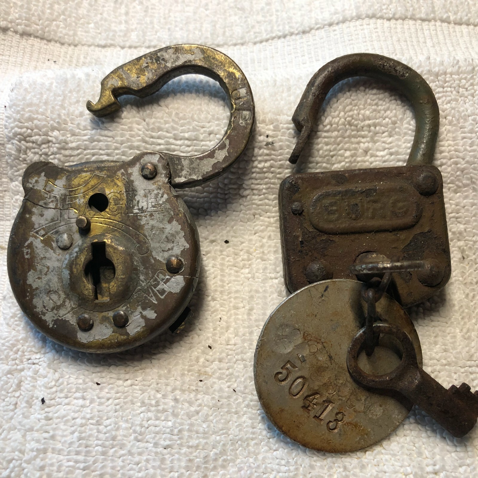 Vintage Brass Eagle Six Lever no key and a Burg lock w/key sold together