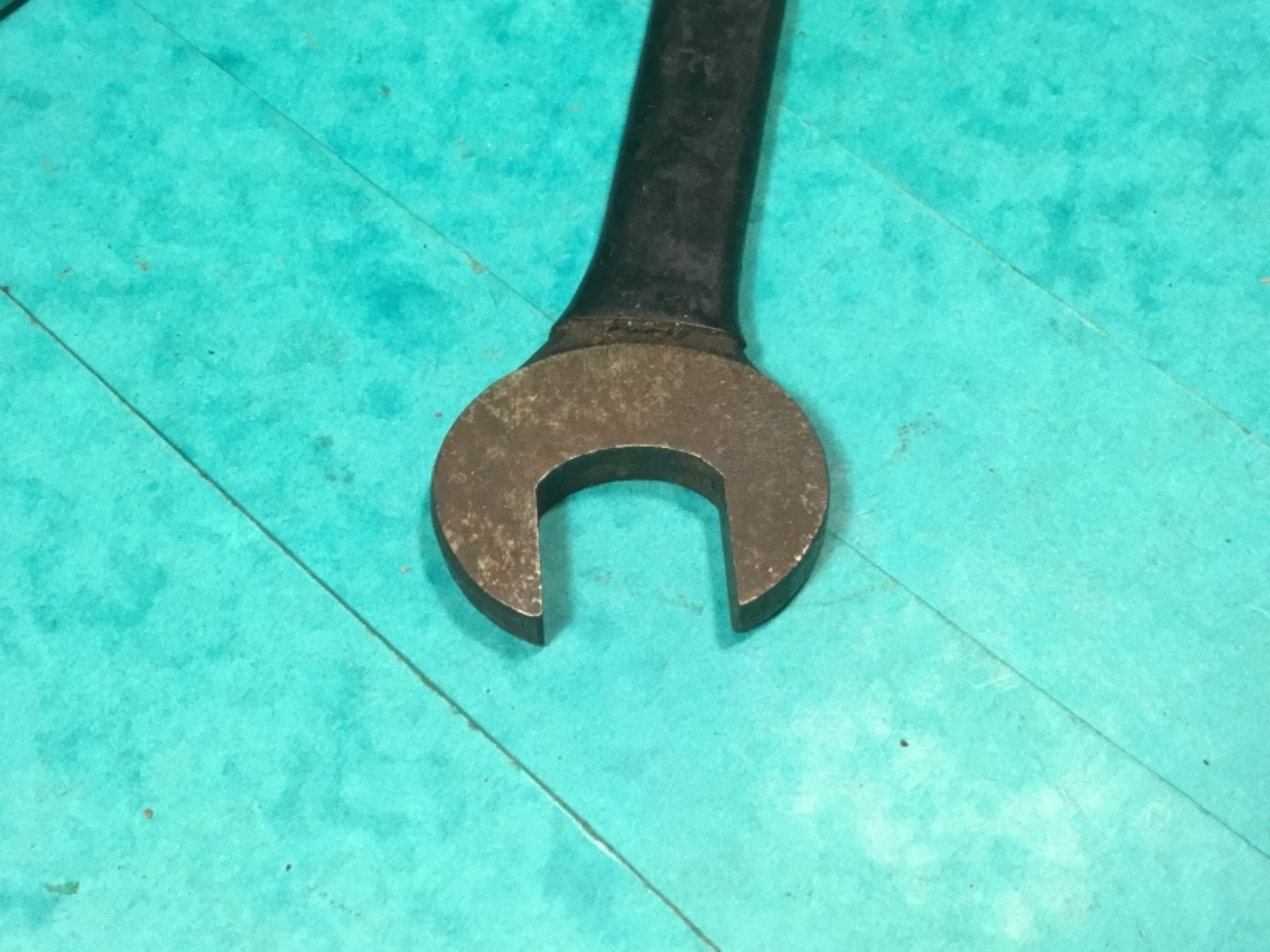 Vintage spanner with complete original black coating, approx 21mm classic tool