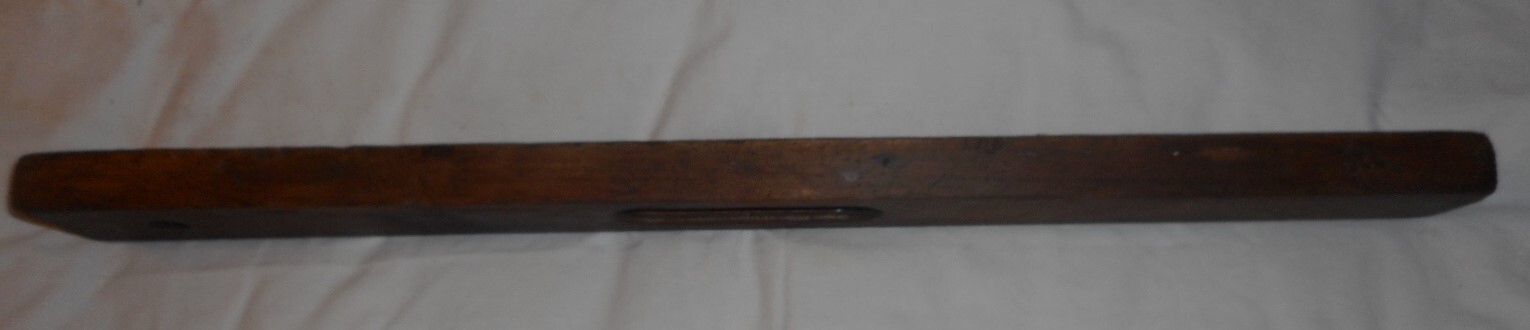 vintage wooden level 24″ long x 2 1/2″ x 1″ red plastic insert 90° & 45° angles
