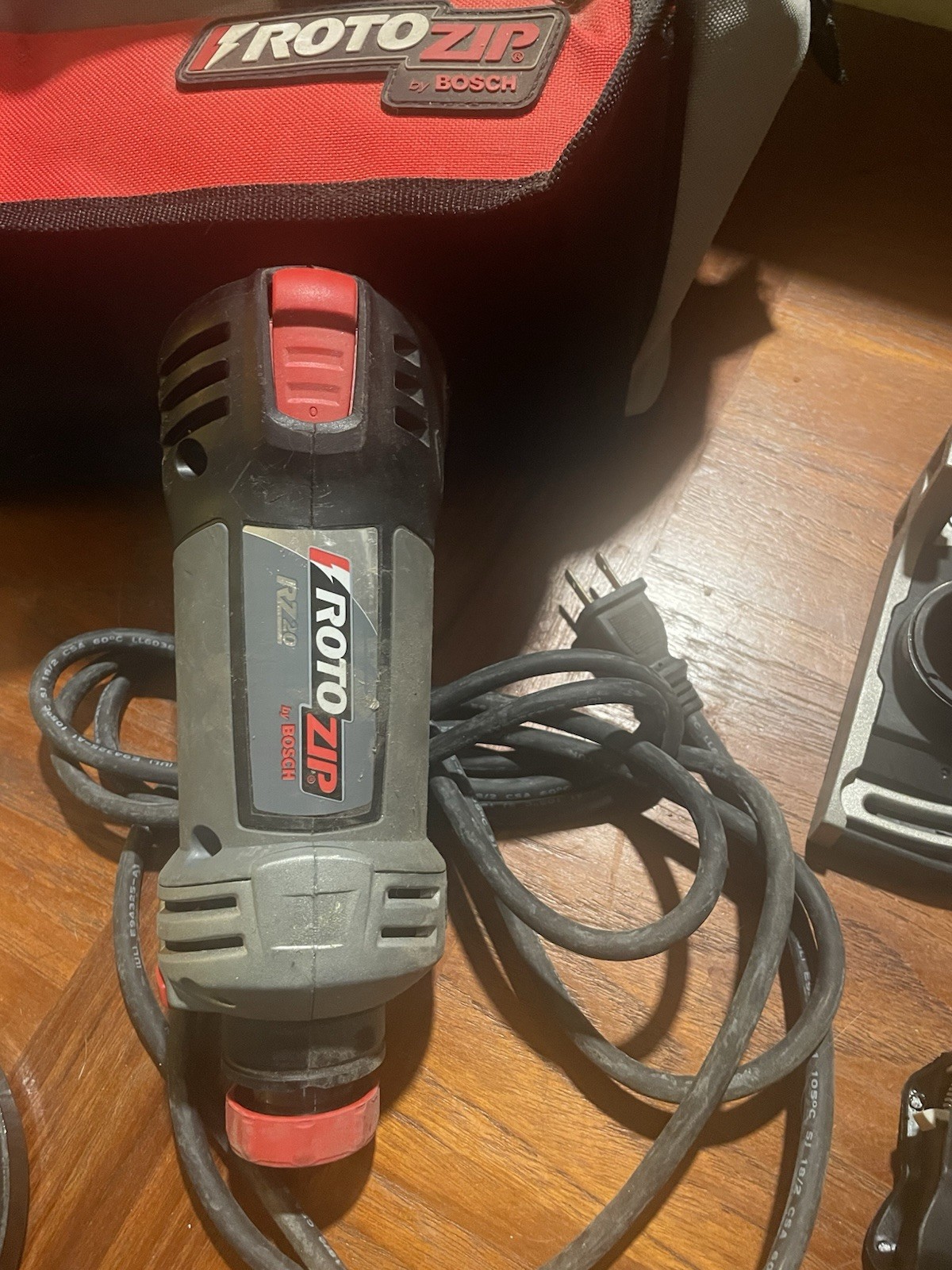 Roto Zip RZ20 By Bosch Complete With Attachments, Blades, Bits, & Bag