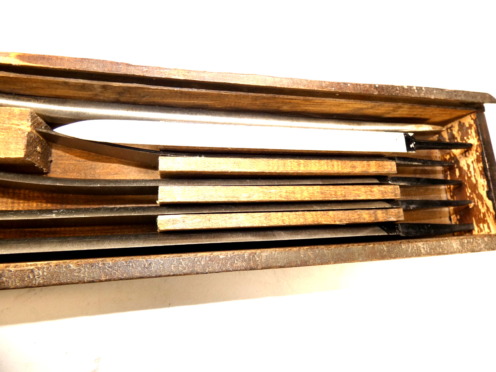 Set of six Mound Tool Steel scrapers; wood, sculpture