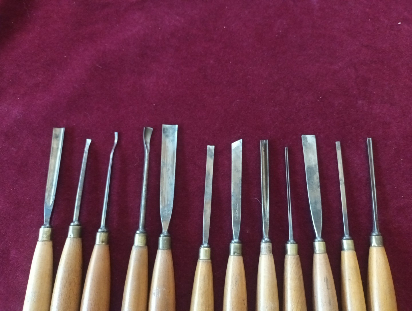 Vintage M & C of London twelve Cast Steel Carving Chisels with Beech Handles
