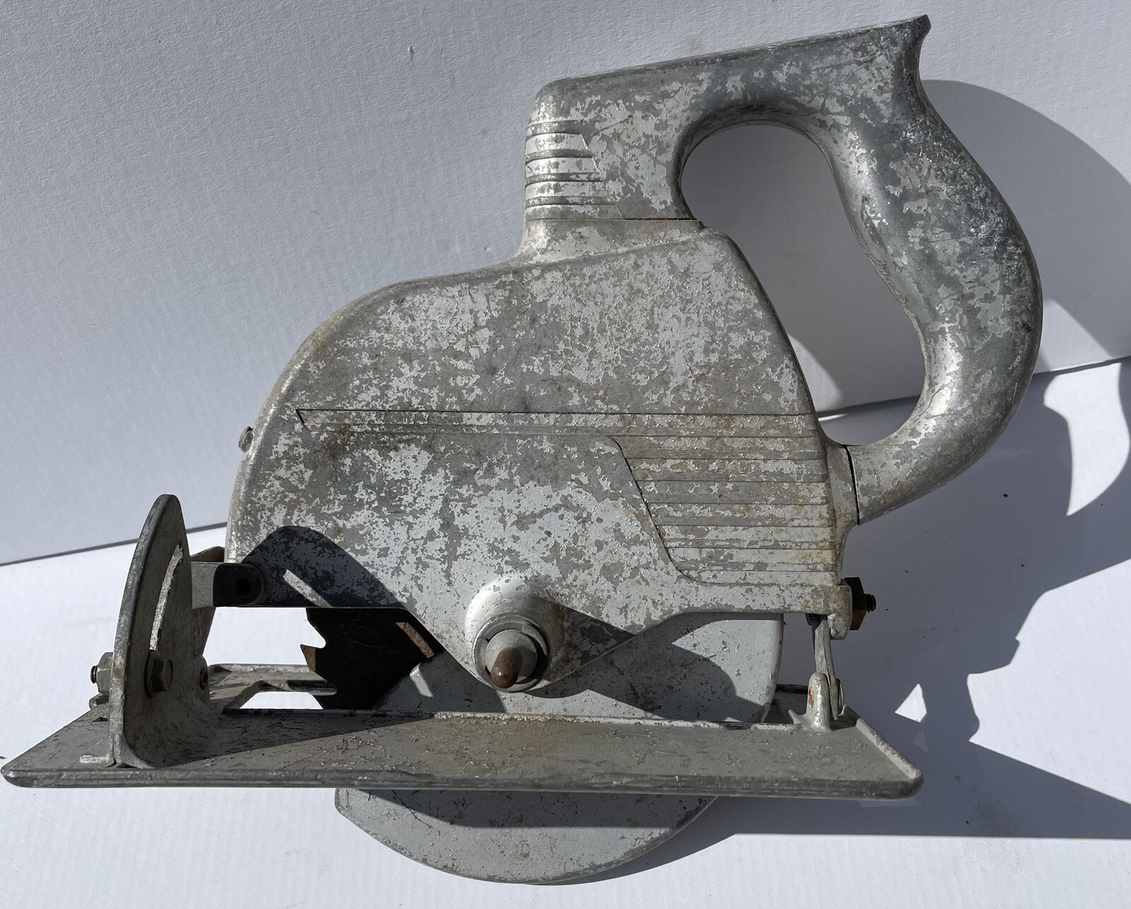 Small Decorative Skill Saw. Approximately 8.5” Tall and 11.5” long.
