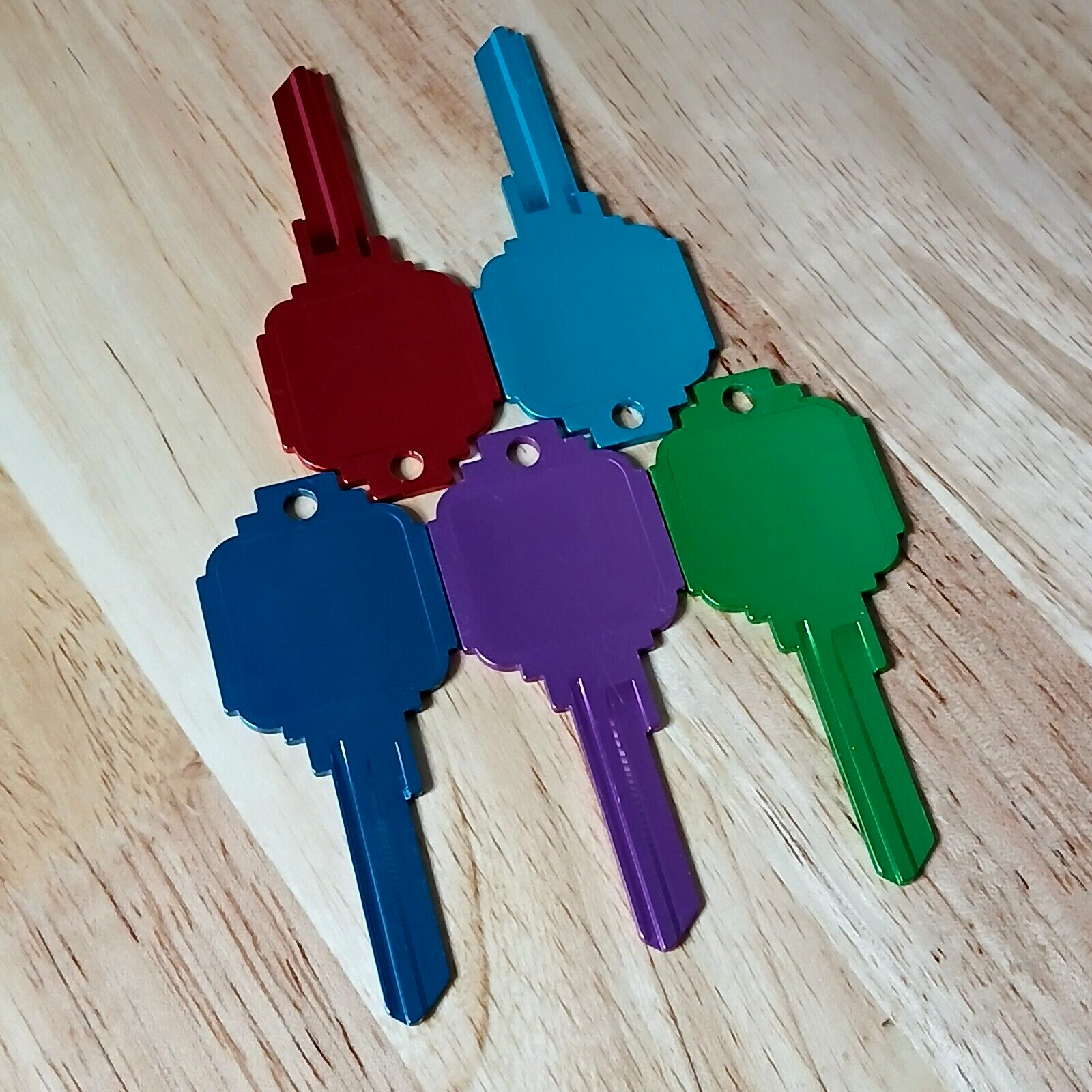 5 Pcs. Titanium Universal Flat Surface House Keys Blanks 5 Colors KW1 Kwikset