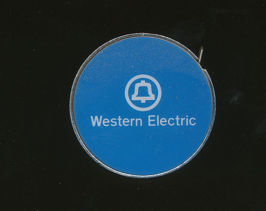 G16 – VINTAGE WESTERN ELECTRIC POCKET ADVERTISING TAPE MEASURE