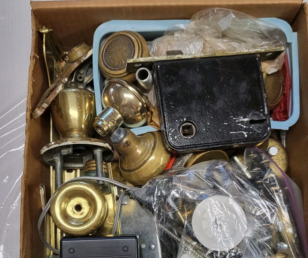 11 Lbs mix lot of used locks, parts,nubs handles etc… Not examined, sold as is