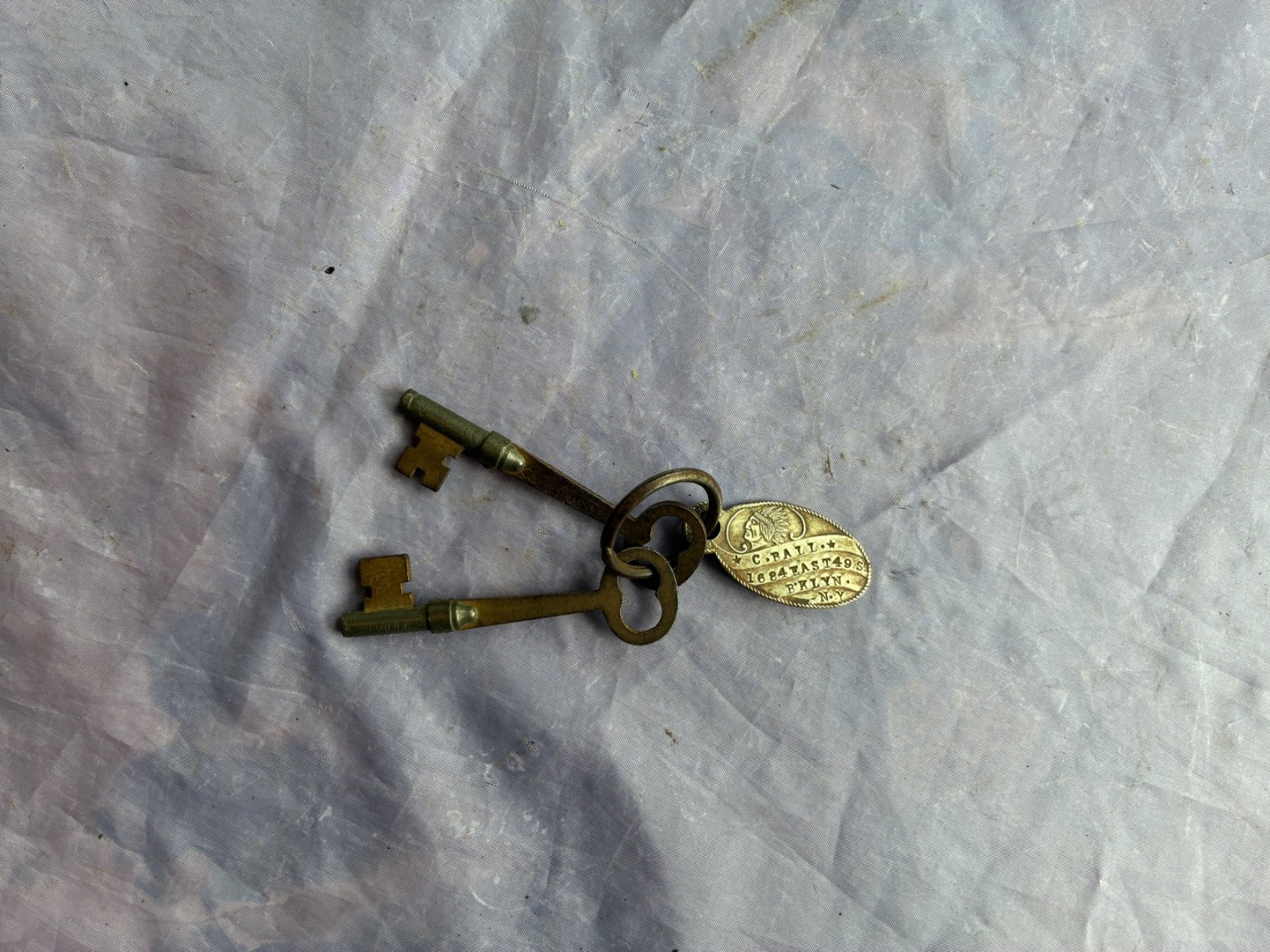 VINTAGE SET OF KEYS MARKED NORWALK LOCK CO W INDIAN BRASS TAG