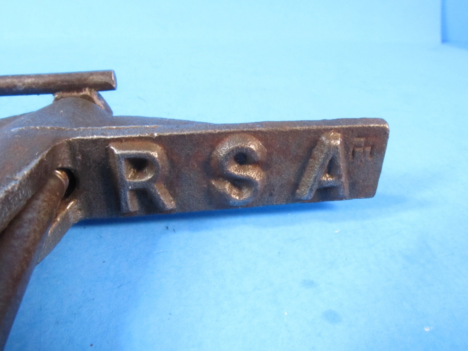 unusual wood lumber marker or clamp imprints “R S A” on both sides
