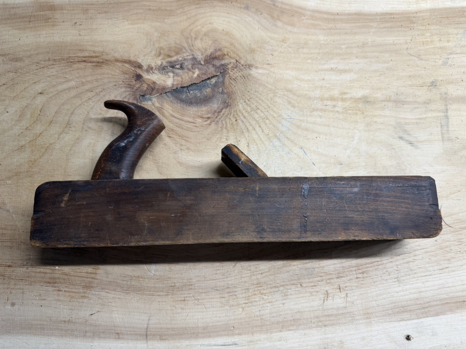 Antique wooden hand plane marked “Edward Carter – Troy, NY.”