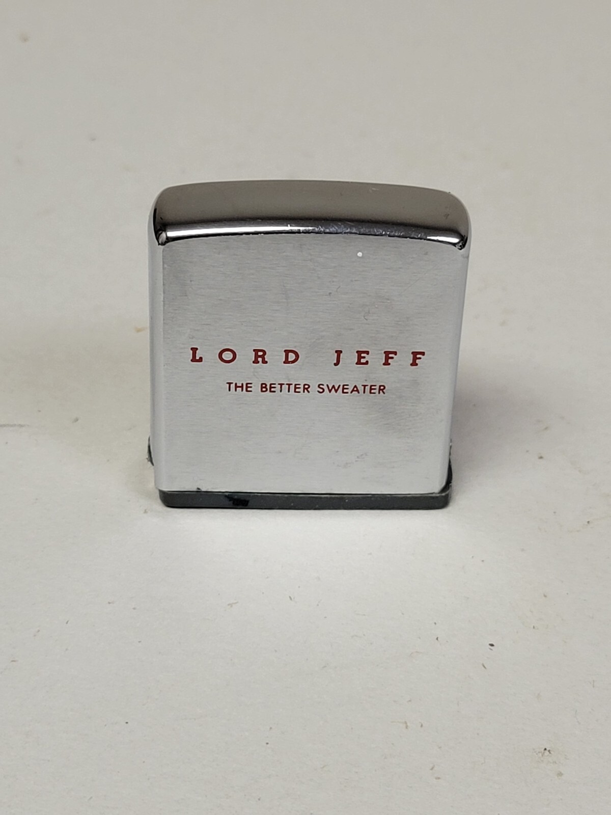 ZIPPO ADVERTISING TAPE MEASURE LORD JEFF THE BETTER SWEATER