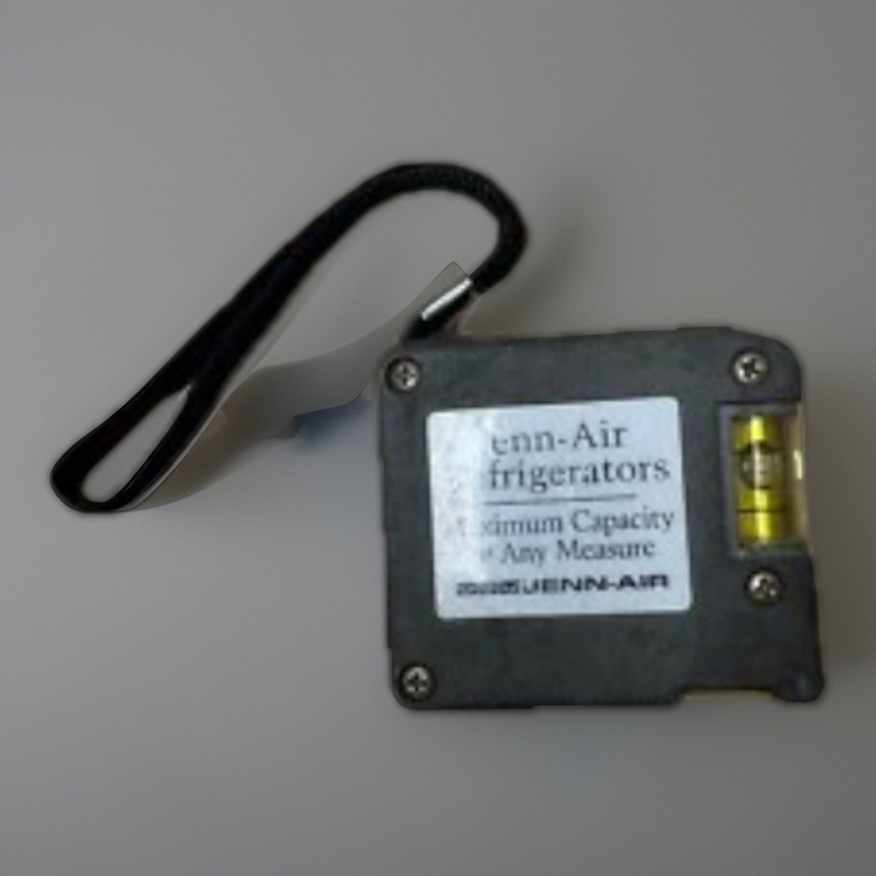 Rare and vintage Jenn-Air tape measure and level combo Maytag