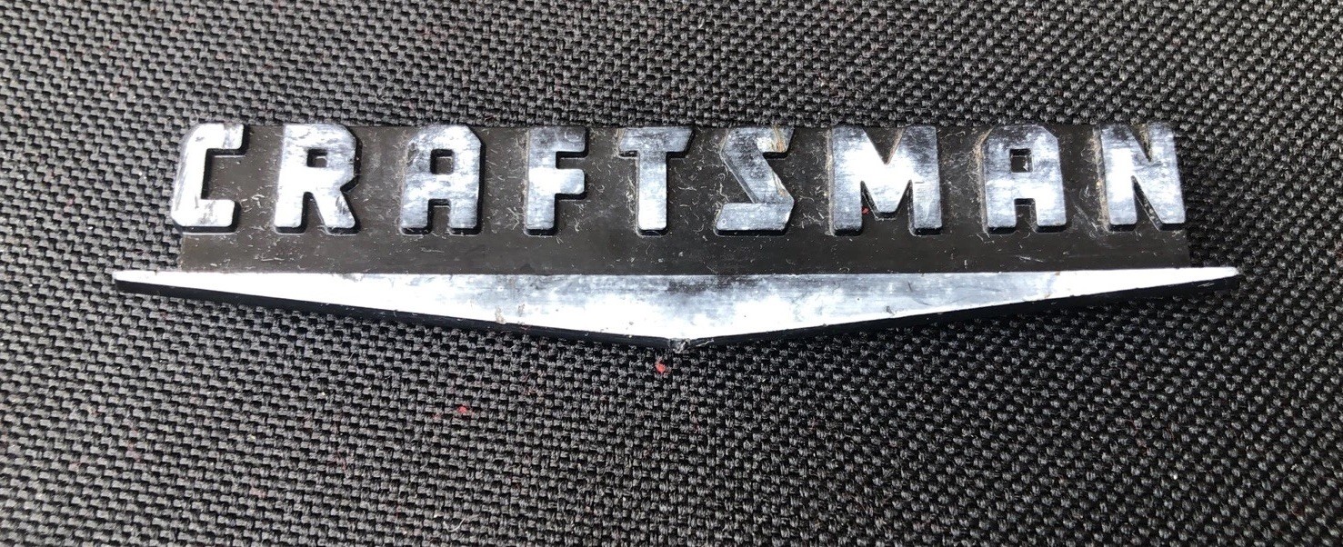 VINTAGE CRAFTSMAN UNDERLINED V PLASTIC TOOL BOX EMBLEM WITH CLIPS TO SECURE IT