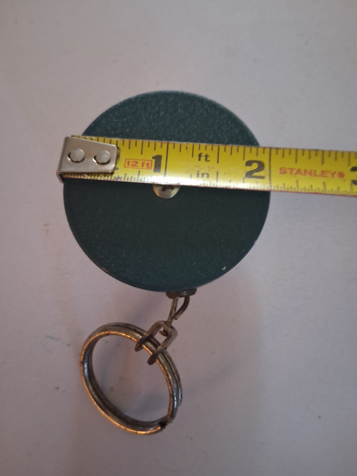 Vintage Metal Key Back Green And Stainless Steel 2″ Across Made In Hong Kong