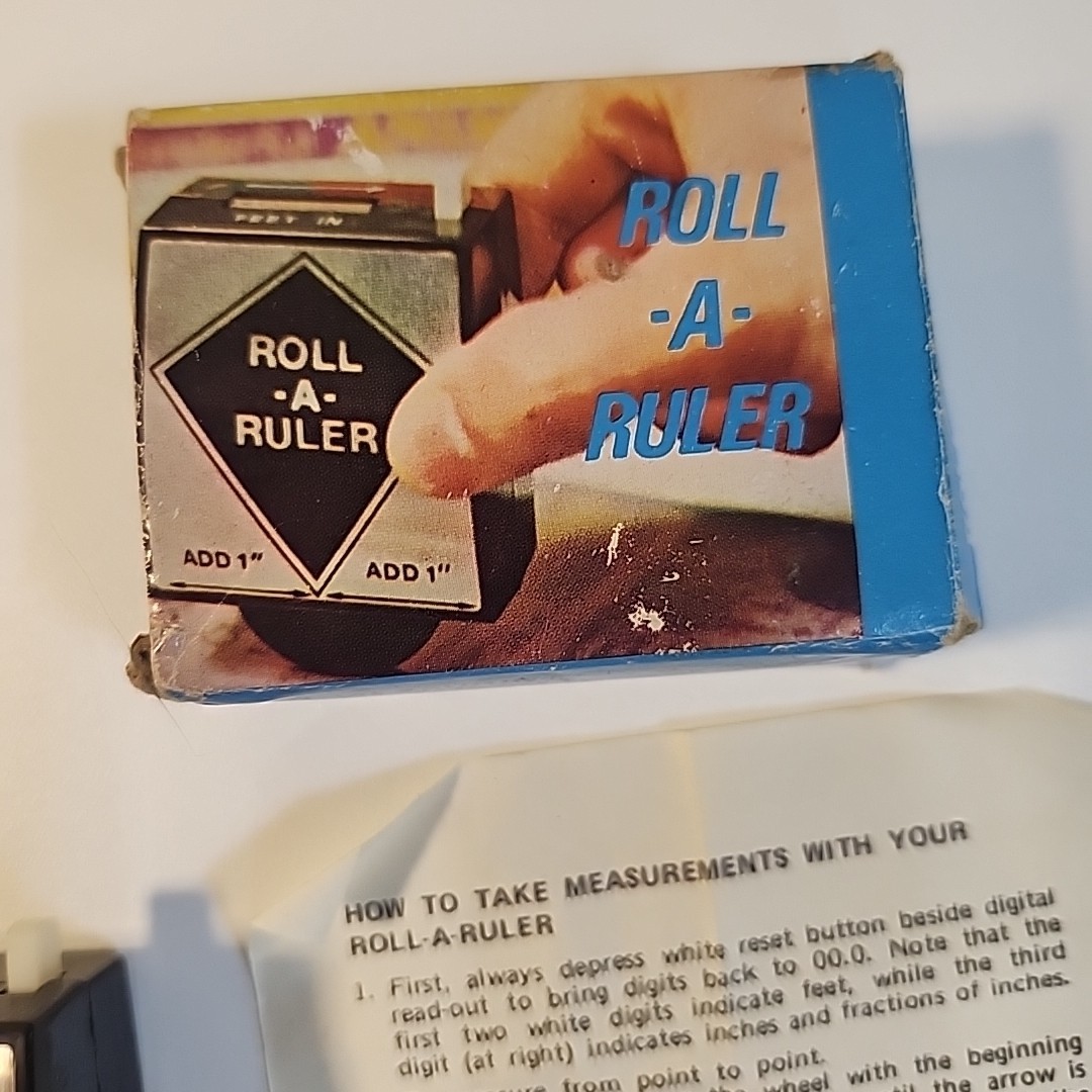 Vintage Blue Roll-A-Ruler Measuring Tool Feet Inches Made in Hong Kong